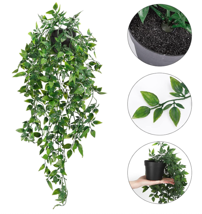 Plantas artificiales en maceta y follaje verde